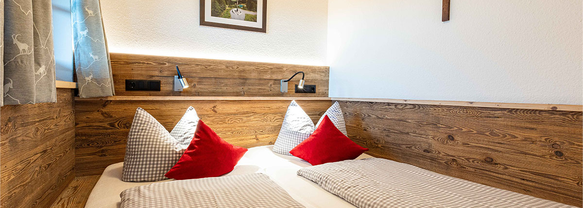 Lenggriesblick Schlafzimmer 2 = supergemütliche Schlafkoje mit TV